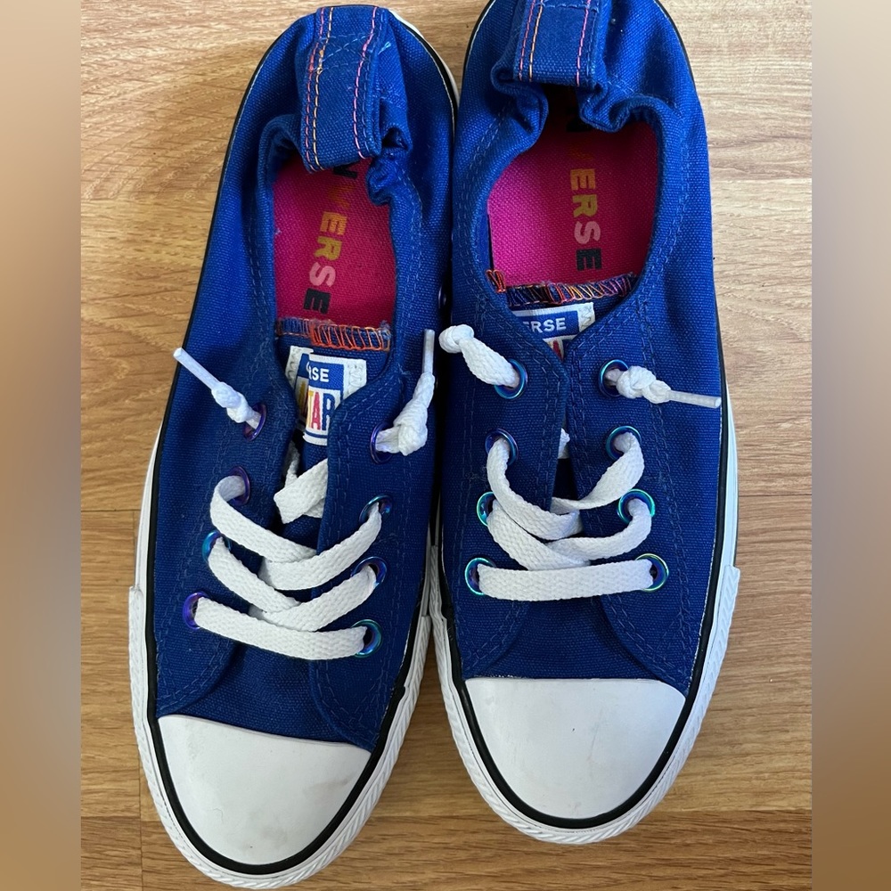Converse low top blue slip ons